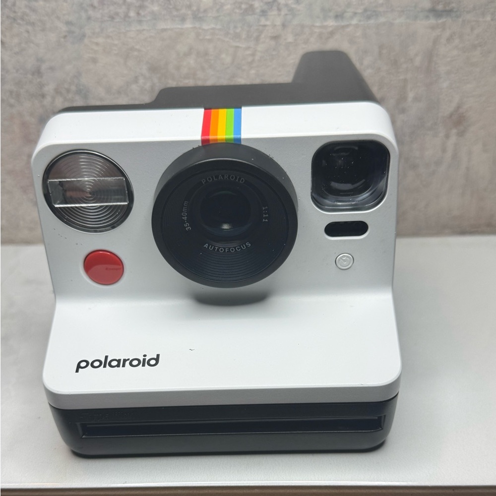 Polaroid Camera with Rainbow Accent and Black Details